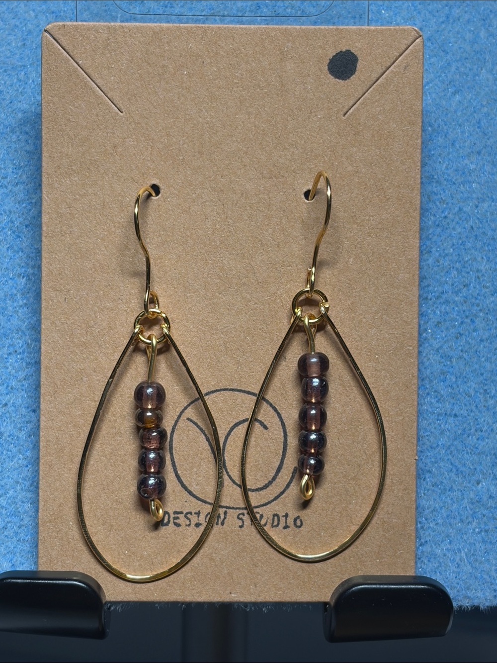 Handcrafted Gold Teardrop Earrings with Purple Beads